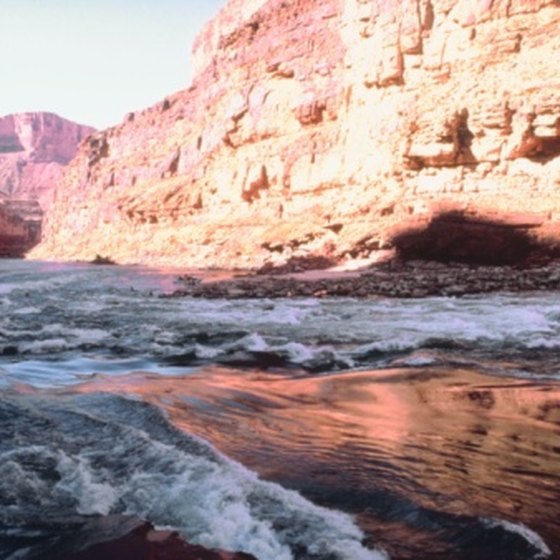 The Colorado River runs through the Grand Canyon, one mile below the canyon rim.