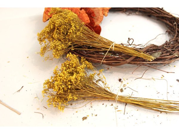 Attach dried wildflowers