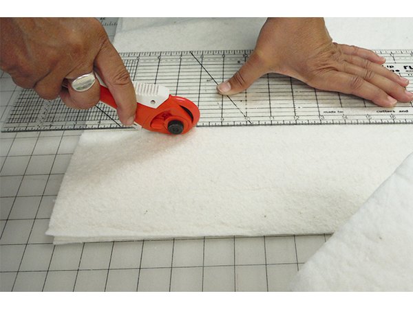 Cut batting squares.