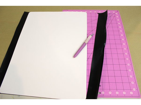 Trim the excess contact paper