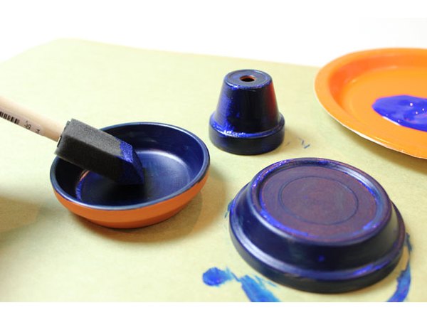 Paint the saucers and smallest pot