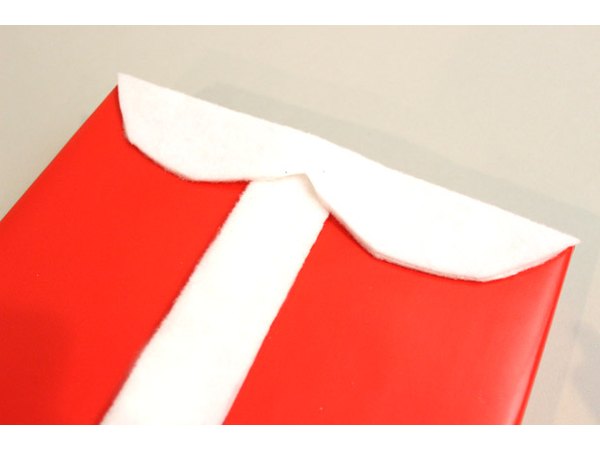 Glue on a white felt collar.