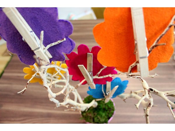 Clip the family photo flowers to the branches
