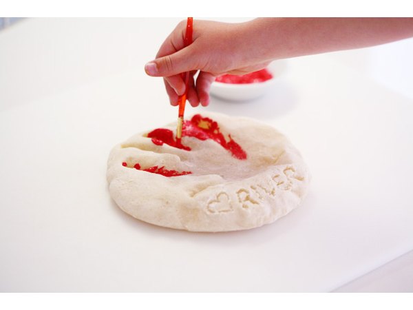 Paint the handprint once clay is dry.