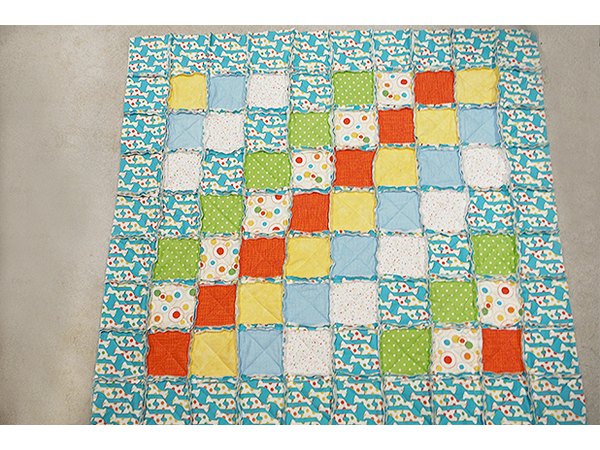 Wash and dry the quilt to soften the seam allowances.