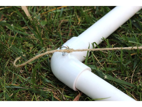 Tie string to eye-hook screws