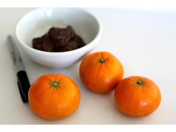 Each clementine will become a jack-o-lantern.
