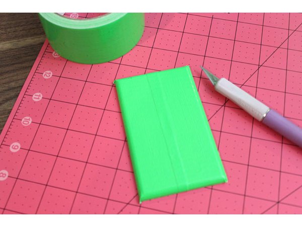 Cover with green duck tape