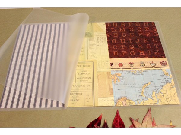 Arrange paper inside laminating pouch.