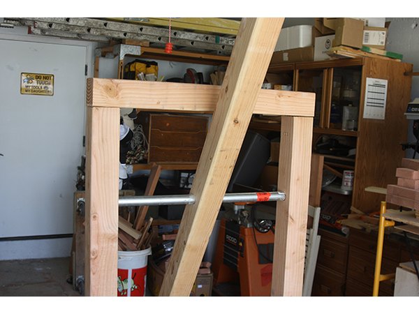 4x4 header is attached with four screws on each side.