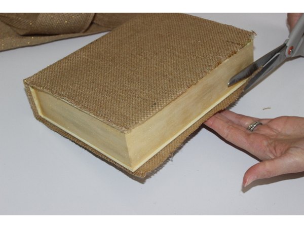 Brush on glue on the edges before cutting.