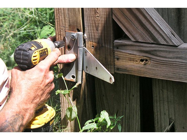 Use a socket on a power drill to remove the lag screws.