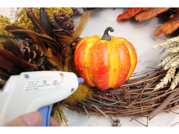 Hot glue gourds to the wreath
