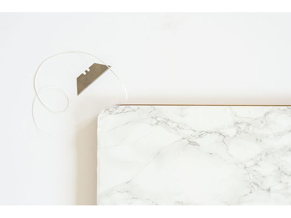 Marble contact paper can be cut to size in order to fit any surface.