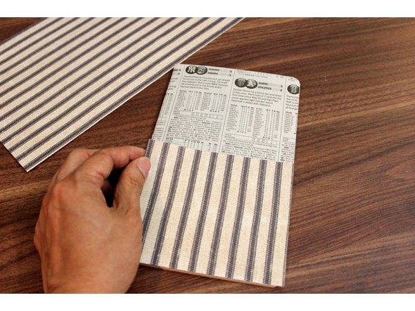 Apply scrapbook paper on top of sports section