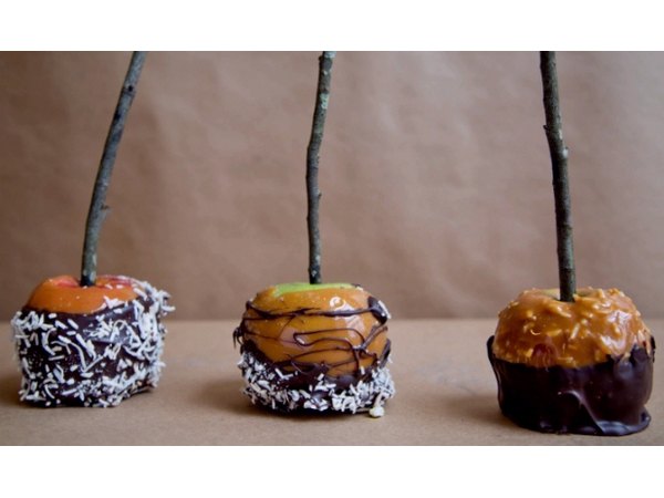 Chocolate and coconut give caramel apples a delicious makeover.