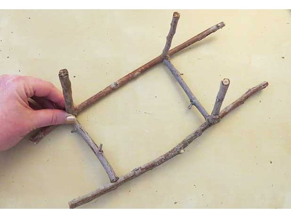 Glue standing twigs.