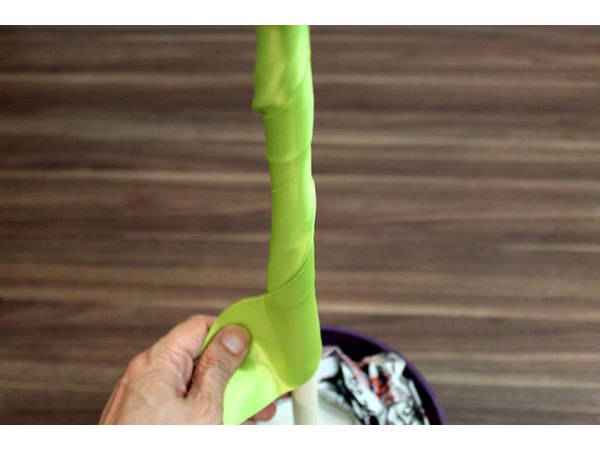Wrap ribbon around the dowel