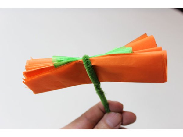 Tie a pipe cleaner around the middle