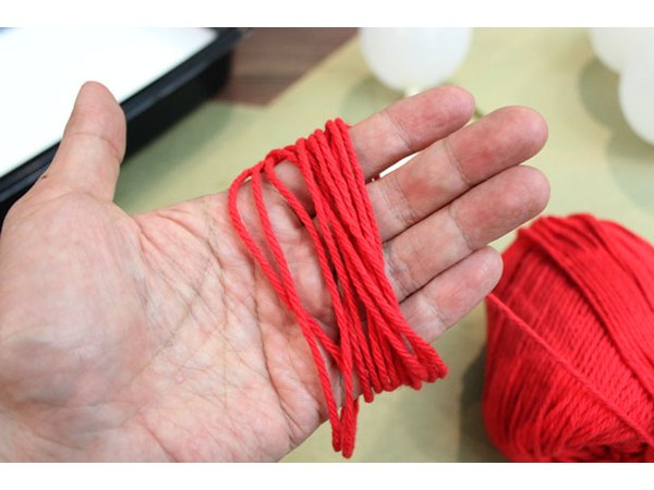Cut off a piece of yarn