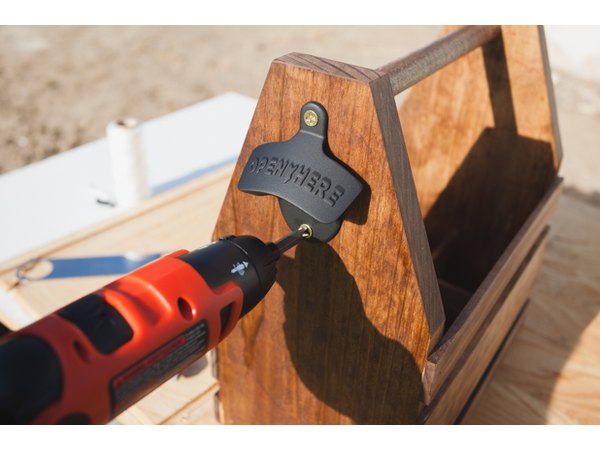 Attaching wall-mounted bottle opener.