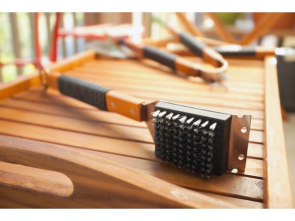 Don't cook over a dirty grill. Clean grates with a good brush.