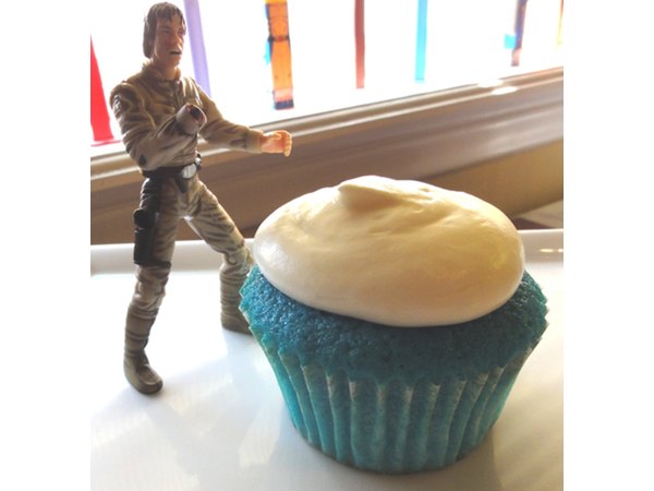 Blue milk cupcakes are still easy to eat after you get your hand cut off with a light saber.