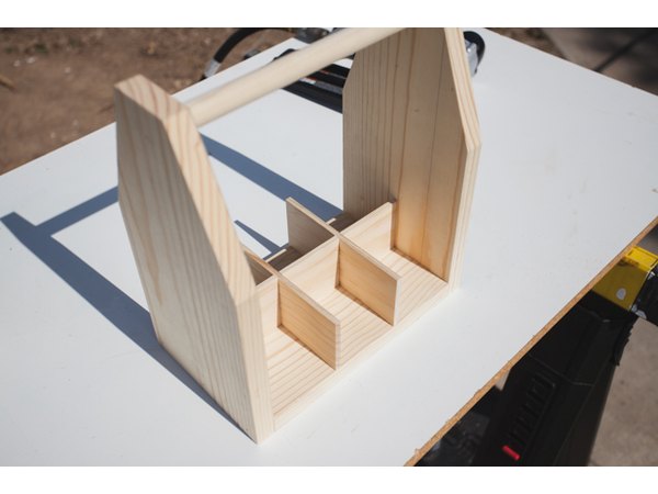 Glueing the divider in place.