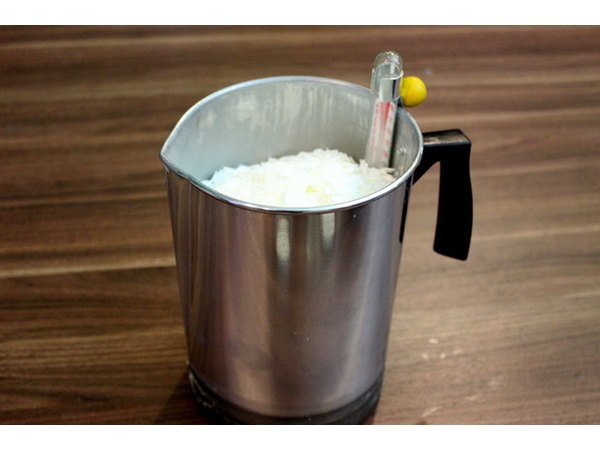 Place wax flakes in the pouring pitcher