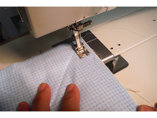 Sew corner to corner, along marked lines.