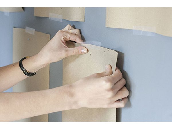 The kraft paper has served its purpose and can be taken down.