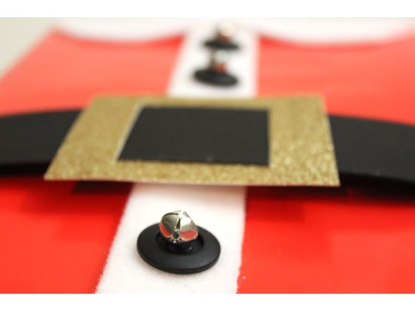 Glue the buttons to the placket.
