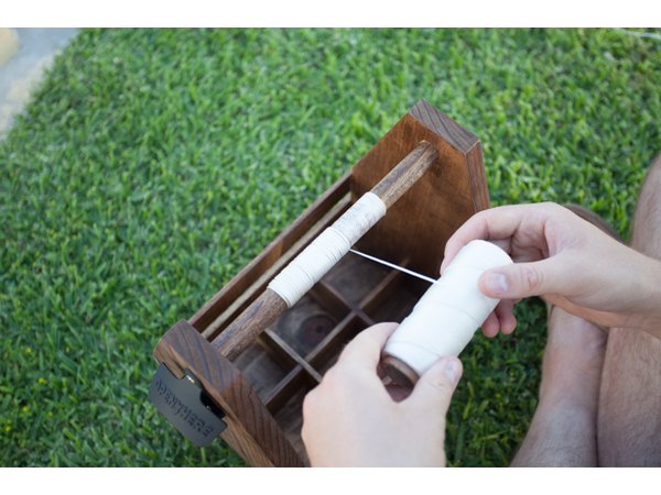 Adding nylon sting to the handle.