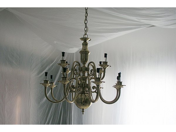 Plastic draped spray booth is ready for the paint.