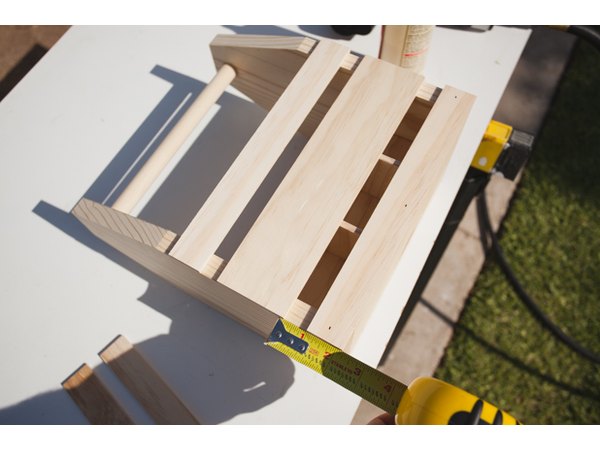 Measuring equal distance between slats.