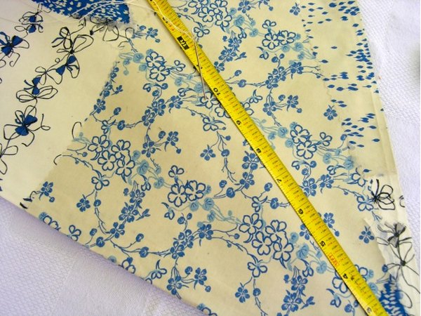Sew through to front and reattach to backside.
