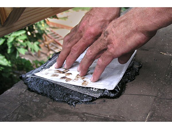 Carefully push the patch into place.