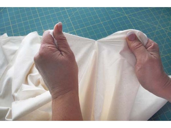 Tearing cotton fabrics results in a straight line.