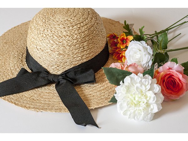 Start with a straw hat that has a wide brim