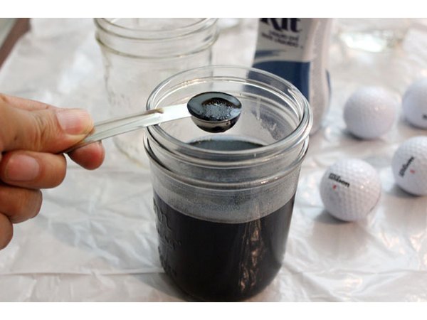 Fill a jar with water and liquid dye