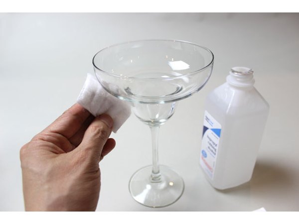 Clean the glass with rubbing alcohol
