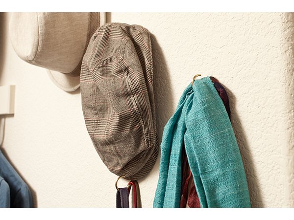 Hooks can hold items both big and small, making excellent use of spare vertical space.
