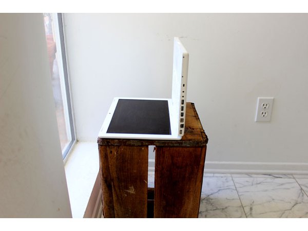Position the laptop with the screen facing the ceiling