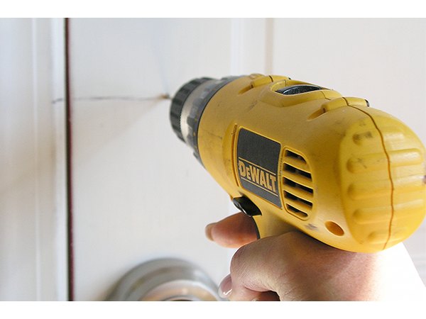 Hold the drill in straight alignment.