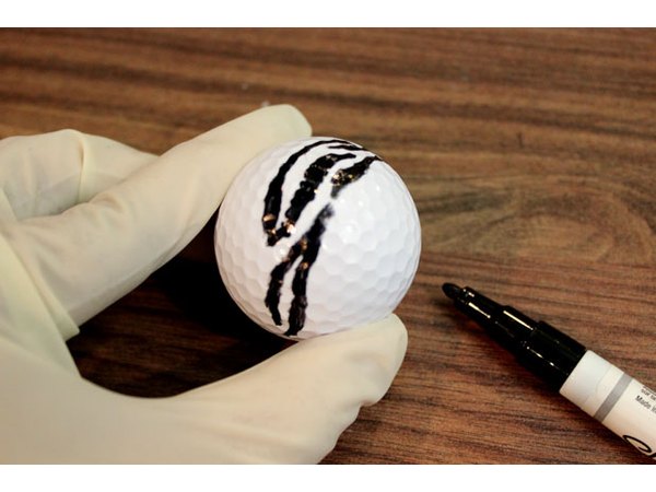 Paint zebra stripes on the golf ball