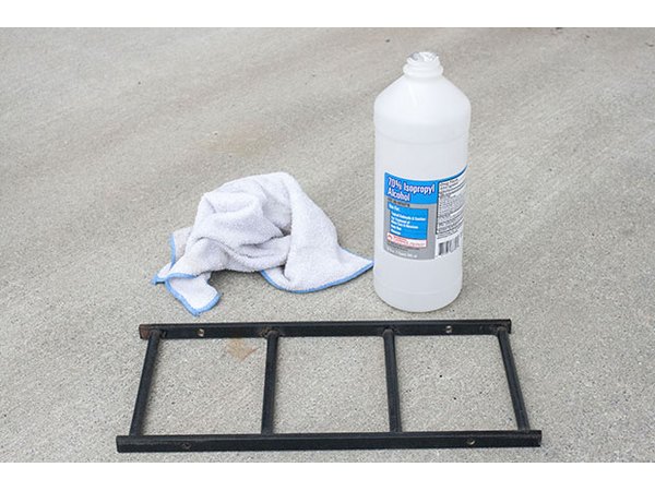 Rubbing alcohol helps cut through 50 years of dirt and grime.