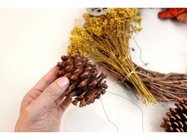Attach pine cones