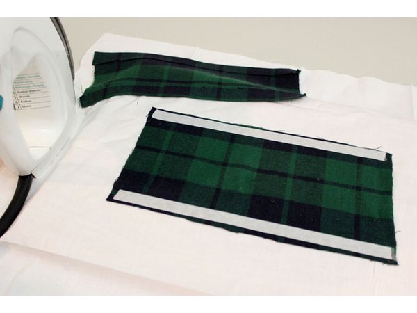 Hem the flannel pieces with fusible web