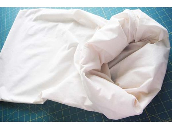 Unroll as you stuff the pillow.