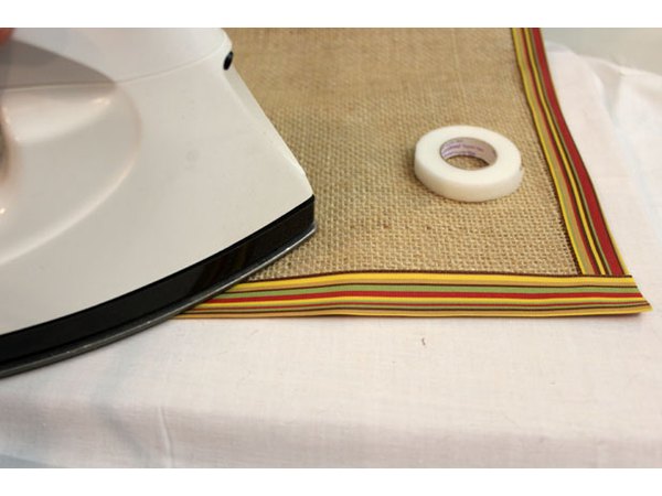 Cover edges with ribbon